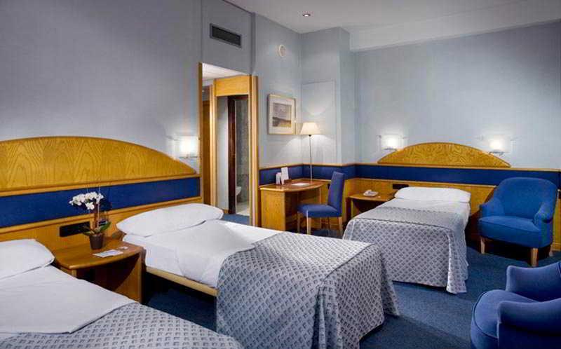 Agumar Hotel Madrid Exterior photo A room at the hotel